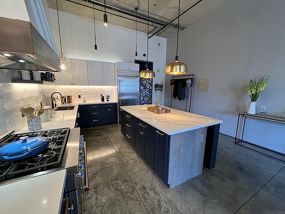 Custom Starmark Cabinets and gorgeous quartz countertop