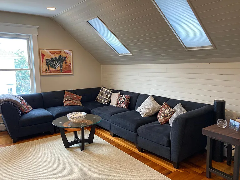 Large living room with skylights