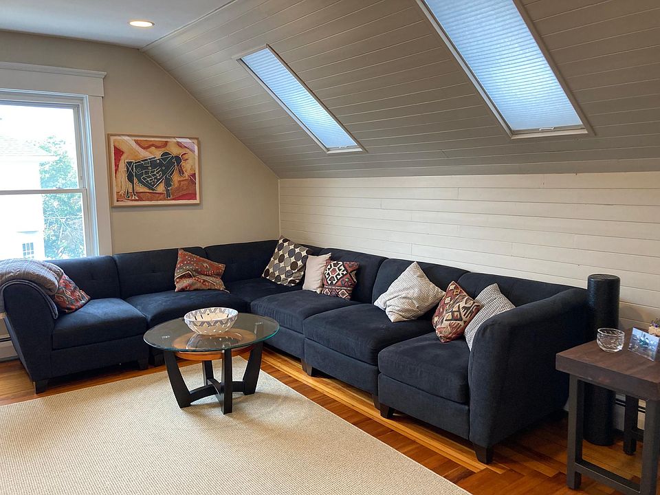 Large living room with skylights