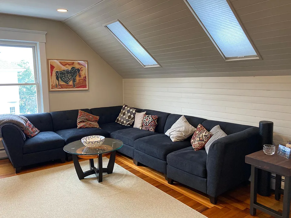 Large living room with skylights