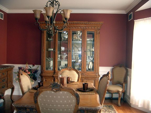 Formal dining room, hardwood floor.