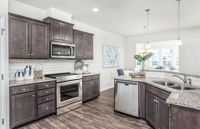 Open Kitchen with walk-in Pantry and Breakfast Bar