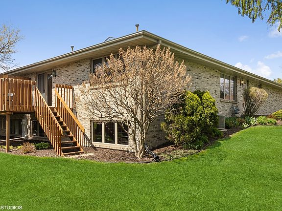 Enjoy this lovely yard without the yardwork or maintenance!