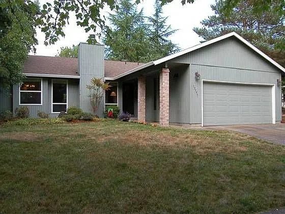 13395 SW Whistling Way photo 1