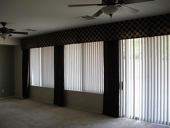Family Room overlooks almost 10,000 sq ft lot with hardscape for your spa!
