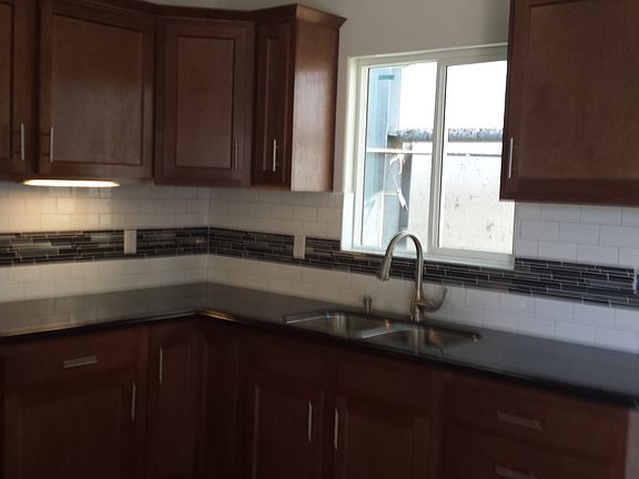 5th image of 9013 S Central Ave