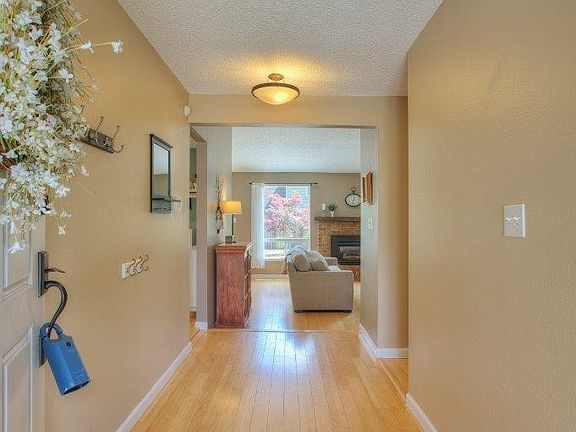 Open entry with lovely bamboo flooring.