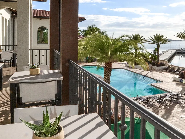 5823 Bowen Daniel Dr Unit 705-large-056-172-WSYC Outdoor Dining Balcony-1500x999-72dpi_05062026