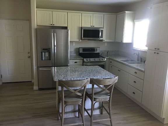 Kitchen with island and all appliances