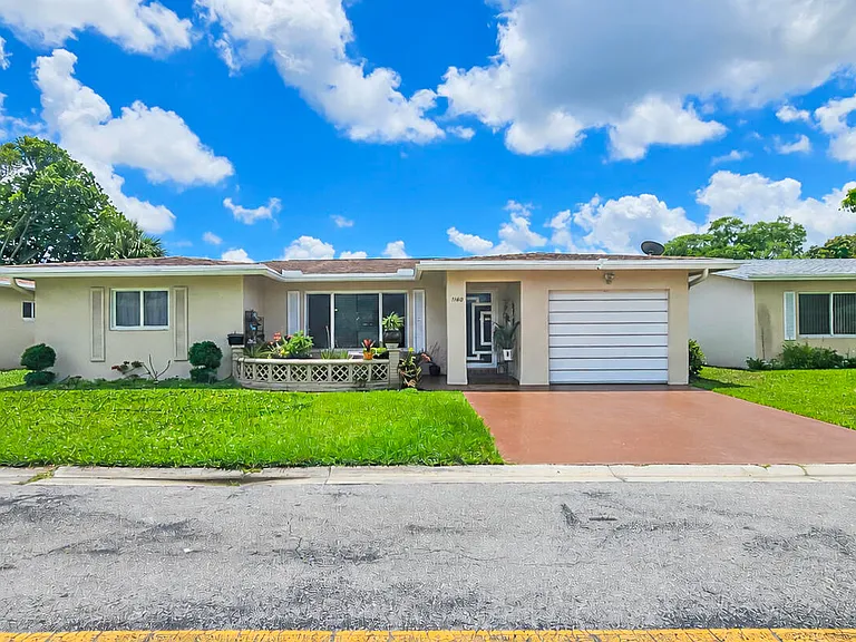 7180 NW 10th Ct — Photo 1