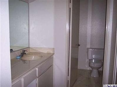 4th image of 10502 Sunland Blvd Unit 1