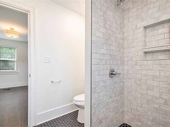 Curbless tile shower.