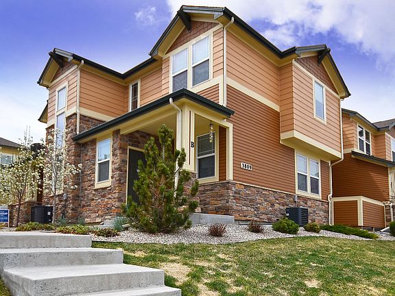 Modern Exterior with mature landscape