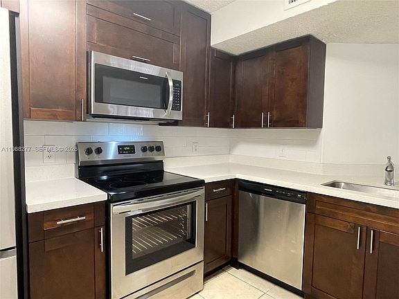 5th image of 8871 Wiles Rd APT 105