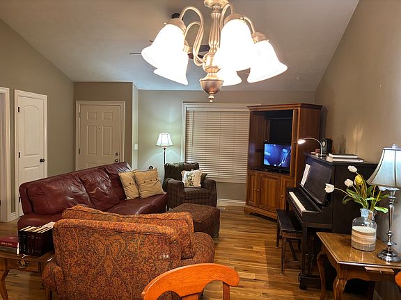 View of front door from kitchen