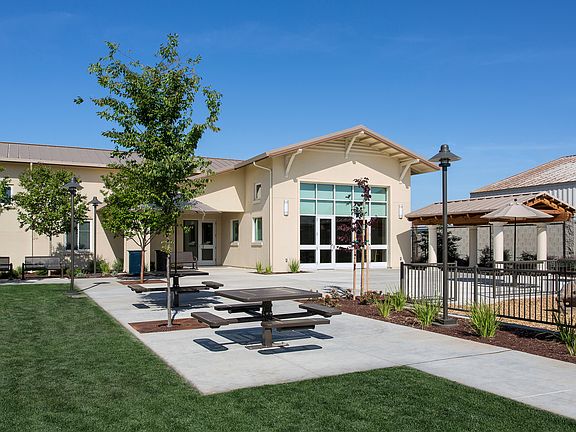 Enjoy community gatherings or quiet moments in this thoughtfully designed outdoor space.