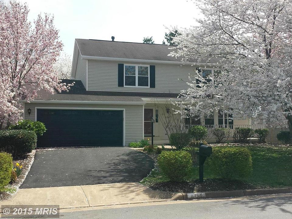 New driveway, garage door.