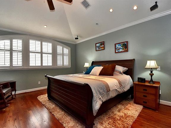 Master bedroom on the second floor has high ceilings, recessed lighting and hardwood floors. The second floor living area and master suite are wired for surround sound.