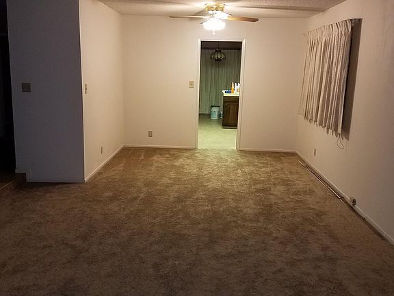 Living room looking to kitchen