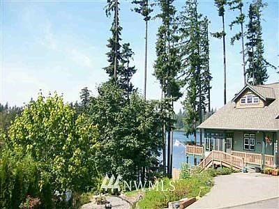 1st image of 228 xx SE Lake Wilderness Dr.