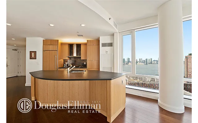 Sold by Douglas Elliman | media 18