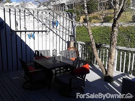 Back deck with great dogwood tree for natural cover