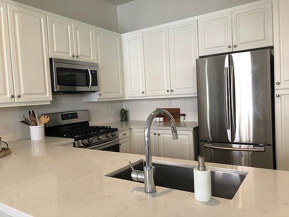 Renovated Kitchen with Stainless Steel Appliances.