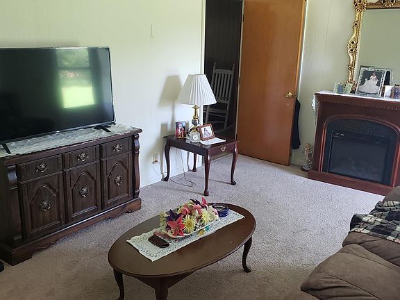 Living room view looking thru to Den