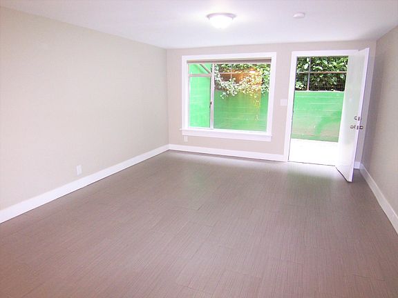 Large living area with abundant natural light
