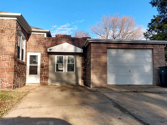 GARAGE & CONCRETE DRIVEWAY