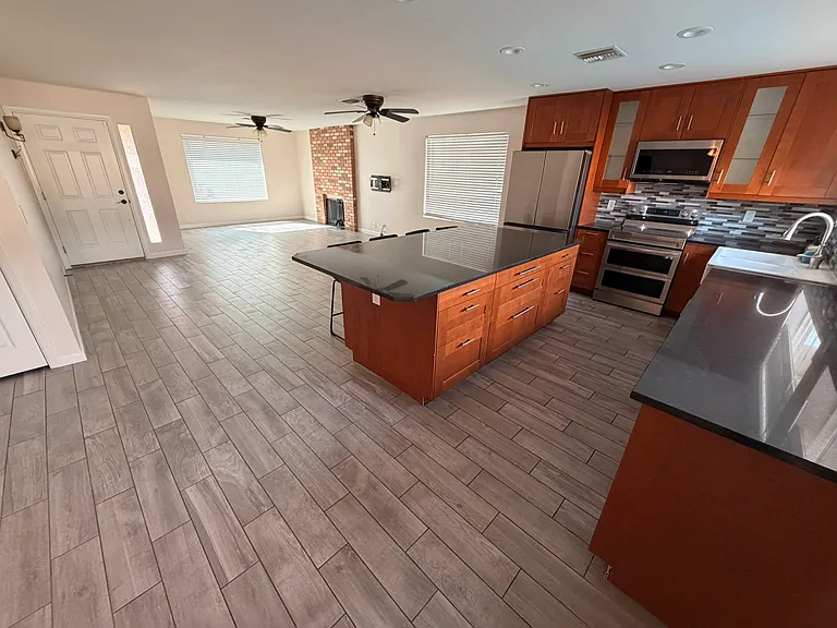 Kitchen and living room with fireplace