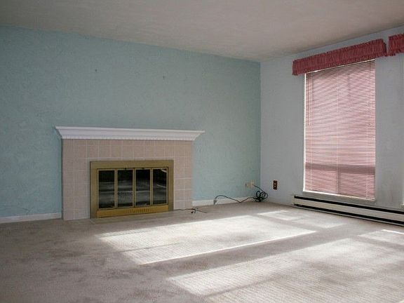 Light, bright and clean - this large living room is waiting for your personal touches! Eating Area a