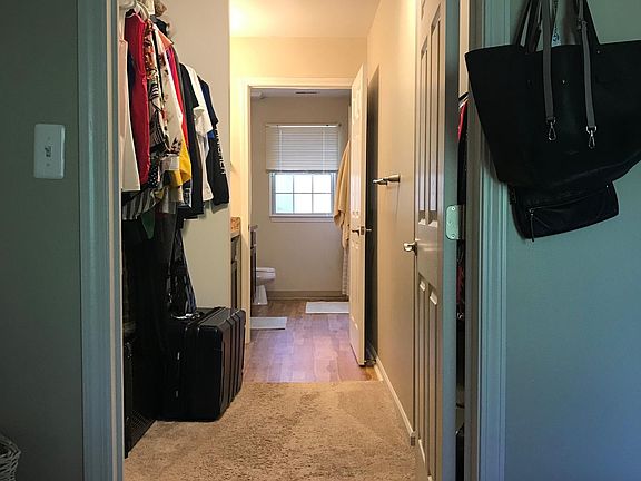 Walk-in closet (leading to half bath, then full bath)