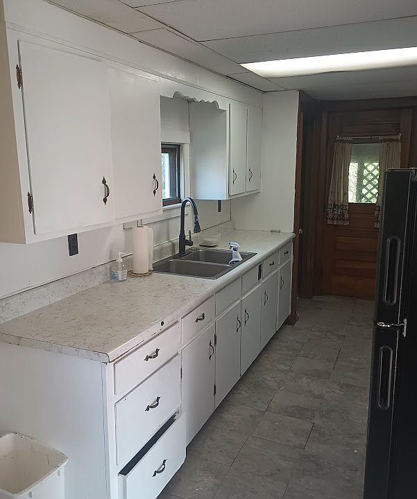 Galley Kitchen with toms of cabinets