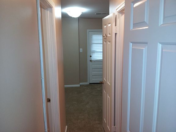 entry door to bedroom bathroom and closet