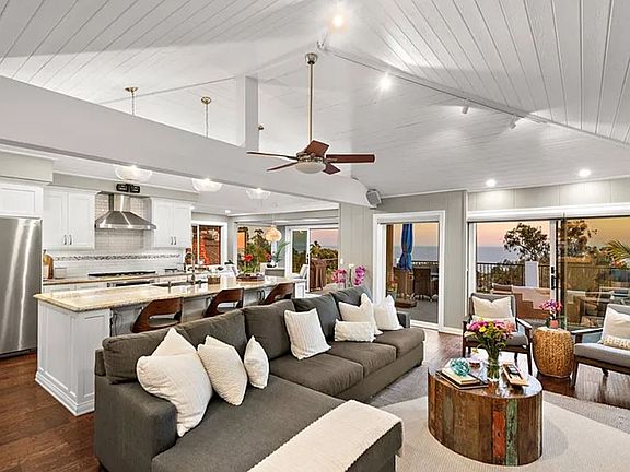 The open floorplan between the gormet kitchen, living room, dining room and large outdoor deck provide for a perfect entertaing space for hosting family and guests.