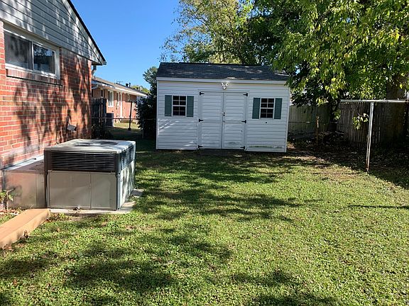 Large fenced back yard and shed with power!