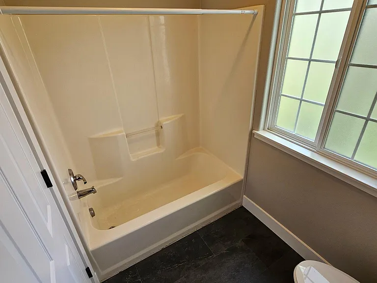 2nd full size bathroom with separated shower and toilet