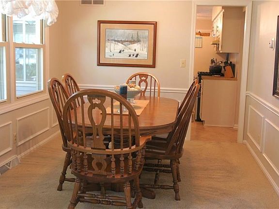 FORMAL DINING ROOM WITH WAINSCOTING
