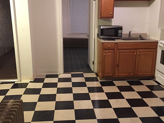 Kitchen looking into bed 1