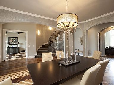 Formal dining opens to foyer