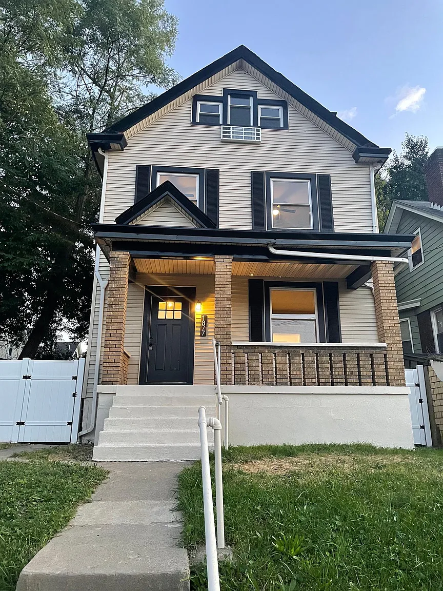 1877 Huron Ave photo 1