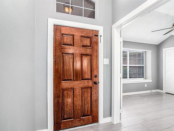 Entrance and view into Study. Perfect for home office or school work, this room could be used as a 4th bedroom/guest room as well.