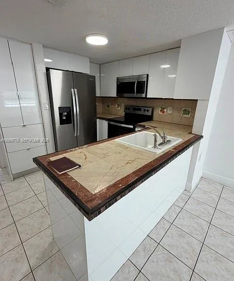 1362 NW 24th Ave #1362 — Photo 2