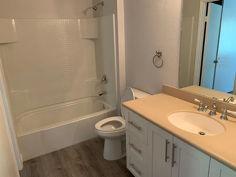 Upstairs bathroom, with newly renovated tub and shower stall, cabinets and flooring. All drawers feature soft close runners as well as soft close door hinges.
