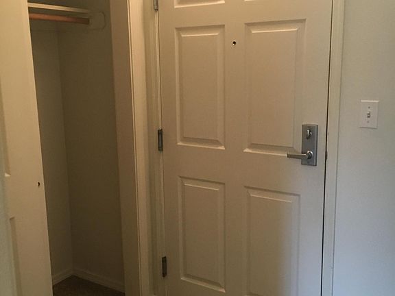 Front door and coat closet