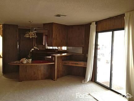 Great room with beautiful light : Double slider opens up on to large patio. Welcomes light and cool 