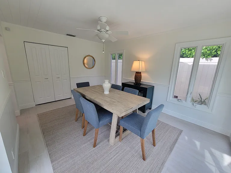 Dining room/laundry area behind doors