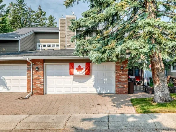 66 E Woodmeadow Close SW, Calgary, AB T2W 4L8
