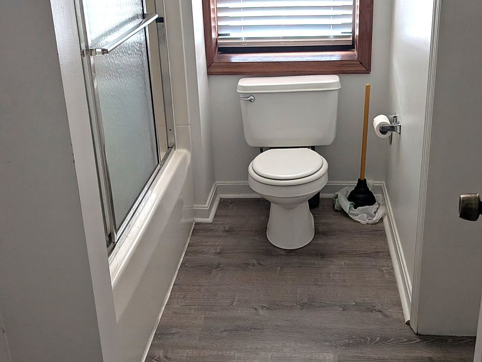Shared bathroom connecting with bedroom and hall